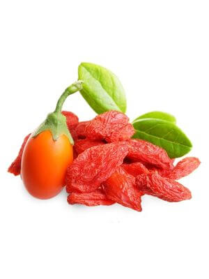 Fresh goji berry with green leaves accompanied by dried goji berries