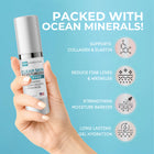 Hand holding a skincare product with text about ocean minerals and product benefits on a blue background